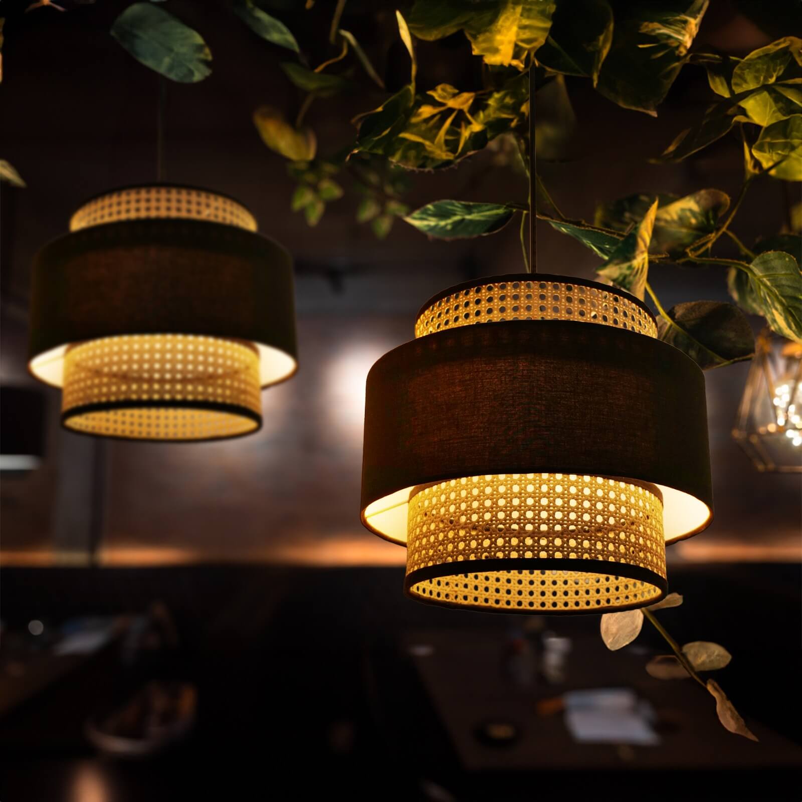 Photo of brown fabric and rattan pendant lights hanging in a café setting