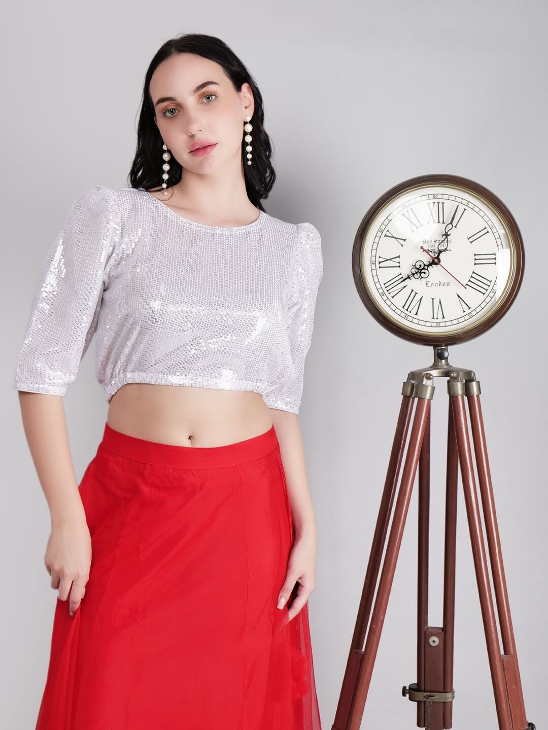 Model in a stylish outfit posing for a fashion photoshoot