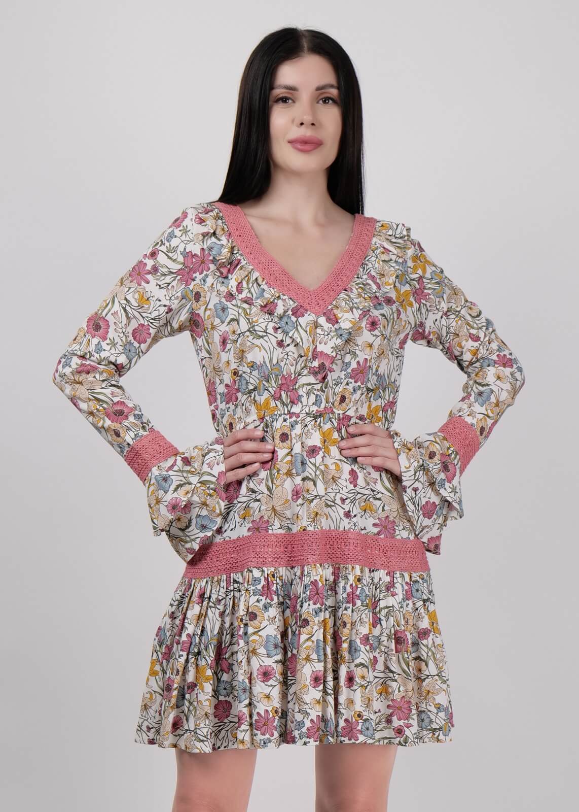 Model in a casual chic dress posing for a fashion photoshoot