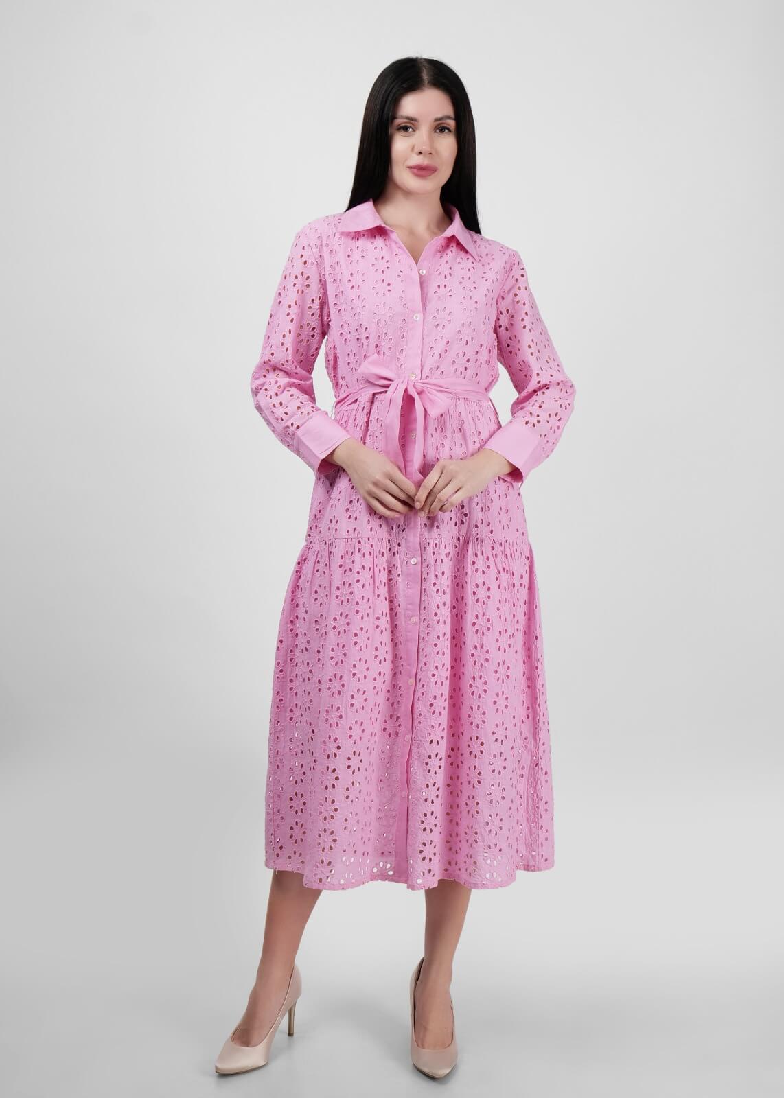 Model in a casual chic dress posing for a fashion photoshoot